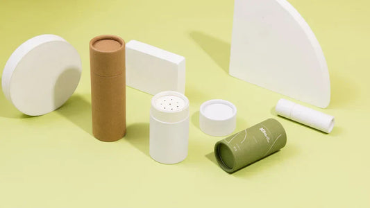 Various eco-friendly paper tube packaging solutions displayed on a light green background, showcasing sustainable options for small businesses.