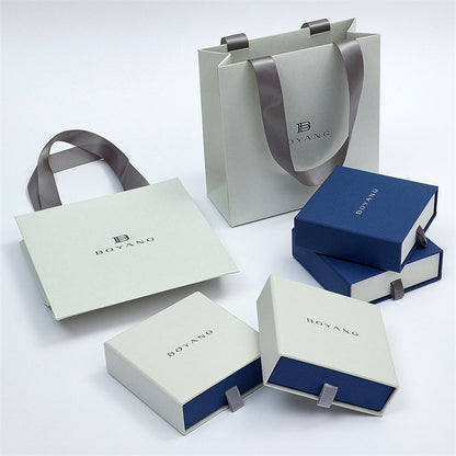 Custom rigid drawer boxes and paper bags